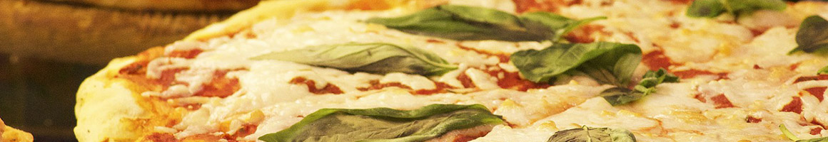 Eating Pizza at Toppers Pizza restaurant in Omaha, NE.
